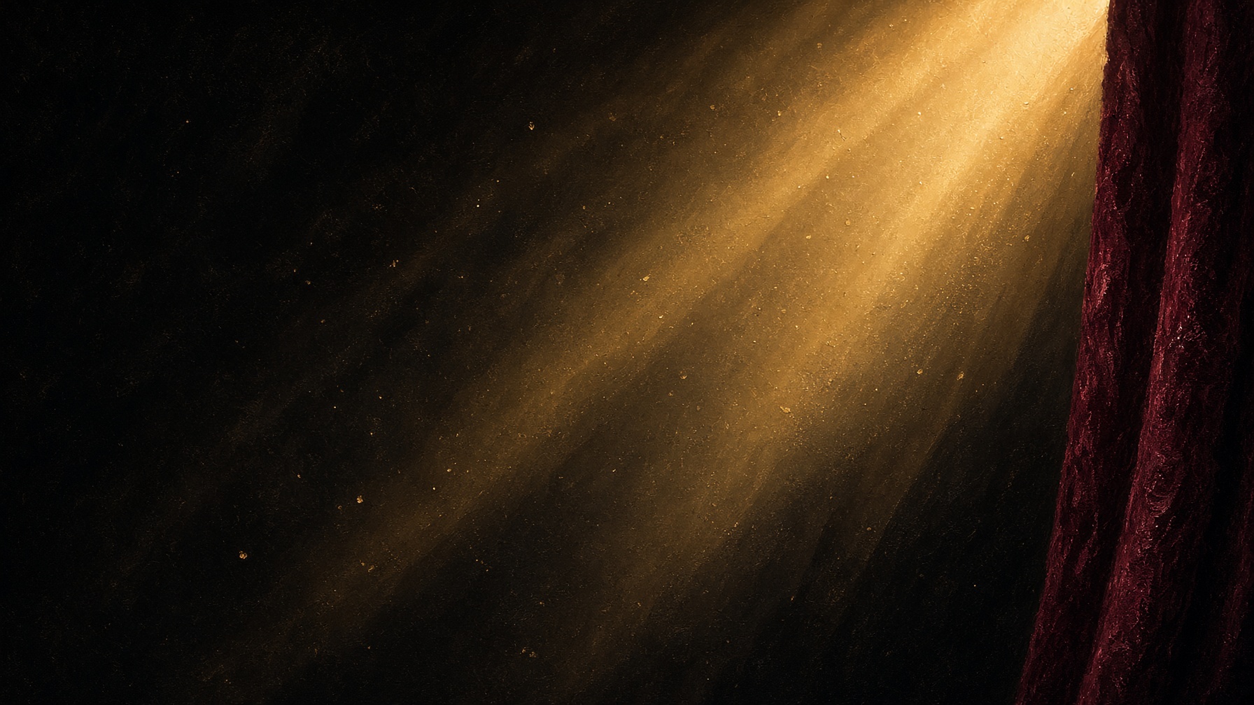 Haz de luz dorada sobre terciopelo oscuro, como el inicio de una función